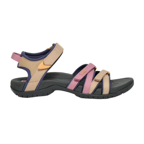 The Teva Womens Tirra Root Light Multi sandal features a dark sole, beige and pink adjustable straps, and a padded heel strap, offering comfort, arch support, and foot pain relief.