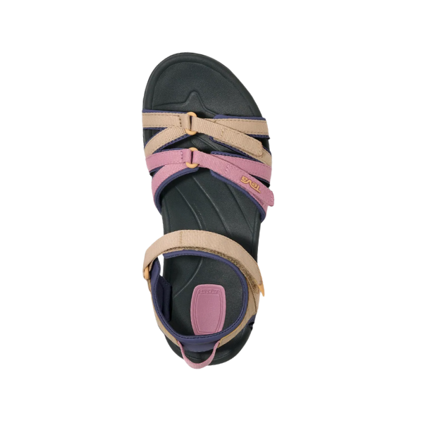 Top view of the Teva Womens Tirra Root Light Multi sandal with a black sole, pastel pink and beige adjustable straps, purple accents, and Velcro ankle closure—arch support and comfort by Teva, shown on a white background.
