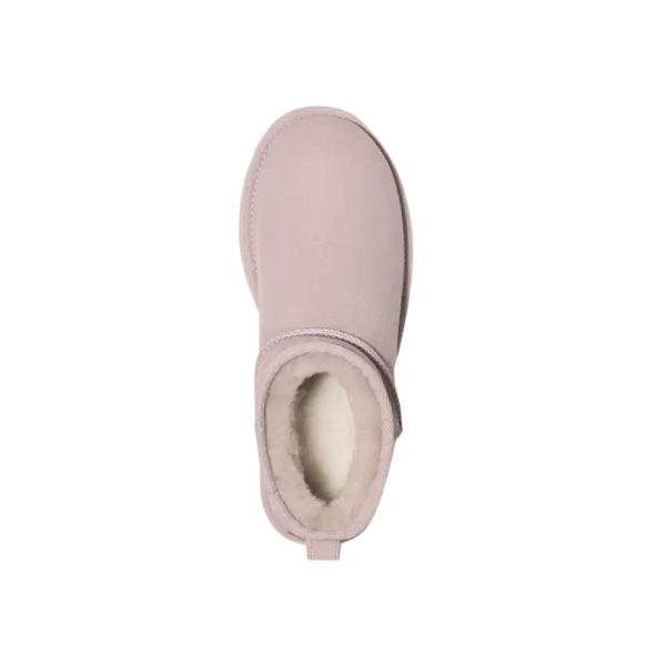 Top view of the UGG Womens Classic Ultra Mini Boot in Pale Smoke, featuring a rounded toe and white sheepskin lining for comfort, shown on a white background.