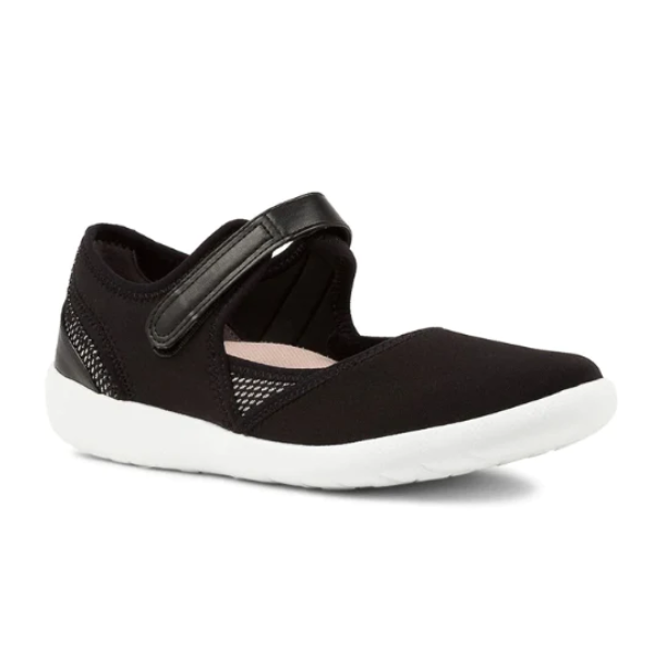The ZIERA Womens Ushery Wide Black is a black slip-on flat with a white sole, Velcro strap, and mesh accents for breathability, offering all-day comfort with its Comfort Plus footbed.