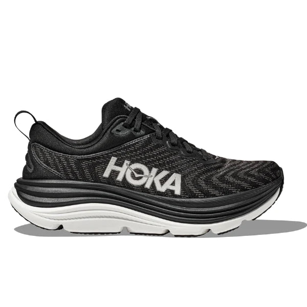 The HOKA Mens Gaviota 5 (Medium Width) in Black/White offers a mesh upper, thick cushioned sole, bold HOKA logo, and Stabilizing H-Frame technology—providing extra support ideal for those with plantar fasciitis.