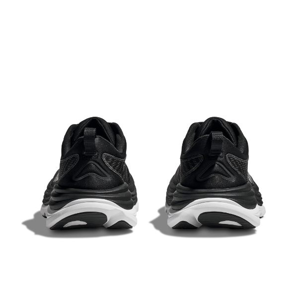 A pair of HOKA Womens Gaviota 5 Wide Black/White sneakers with white soles and Stabilizing H-Frame technology, shown from the back side by side on a white background.