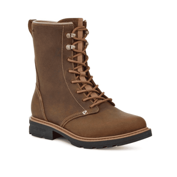 The Teva Womens Rowena Lace Honey Brown is a waterproof leather ankle boot with a sturdy black sole and metal eyelets, designed for foot pain comfort. Shown angled right on a white background.