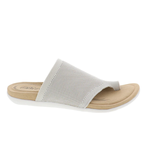 The Biza Womens Lavish Sand sandal by BIZA FOOTWEAR features a beige mesh upper, open toe, and cushioned contoured sole for all-day comfort—a minimalist travel sandal with casual style.