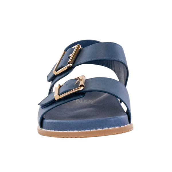 Front view of the ZIERA Womens Hastice Blue Leather sandal, featuring two Wide leather straps with large gold buckles and a flat light brown sole, designed for style and foot pain relief. Isolated on white background.