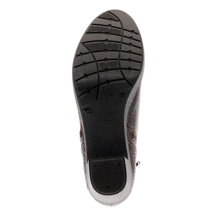 The image displays the bottom view of a black Sovella Womens Kelly boot sole by SOVELLA, featuring textured treads for grip and a rectangular heel area designed to reduce heel pain common with traditional leather boots.