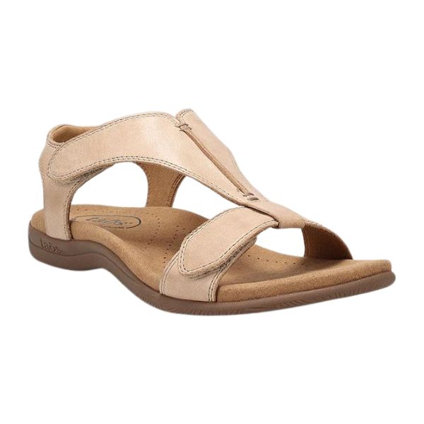 The TAOS Womens The Show Stone sandal features a beige leather open-toe design, contoured antimicrobial footbed, adjustable hook-and-loop straps, low comfortable sole, and reliable arch support for everyday wear.