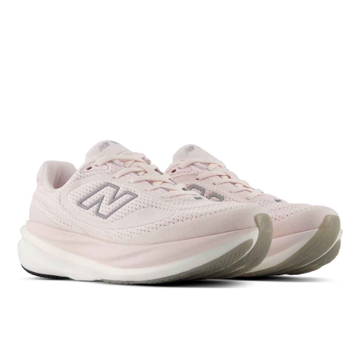 Top view of a pair of NEW BALANCE Women's 1080v15 Pink Salt running shoes, breathable mesh upper and pink laces.