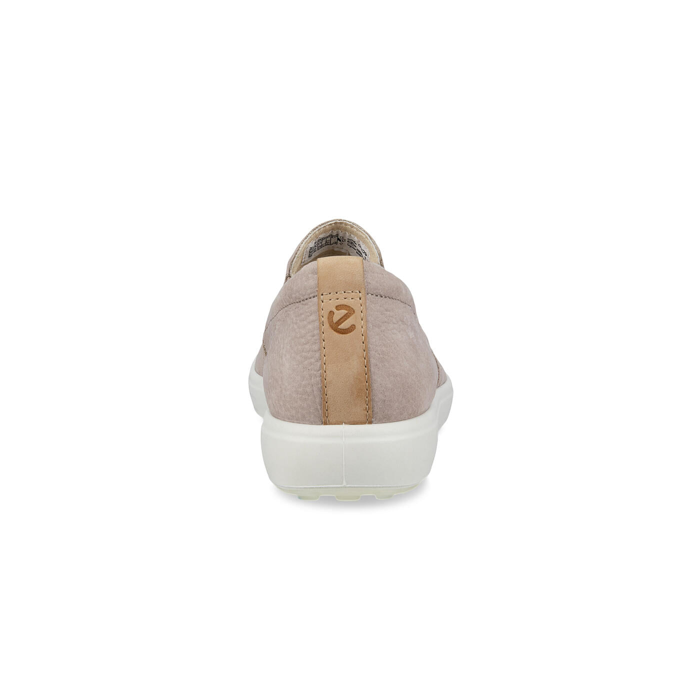 The ECCO Womens Soft 7 Slip-On Grey is shown from the back, with a tan full grain leather pull tab featuring a circular logo and a white sole, set against a plain white background.