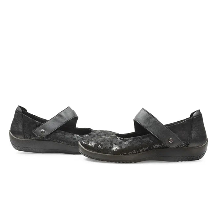 The Arcopedico Womens Cosmo Black by ARCOPEDICO features textured soles, side floral patterns, and adjustable top straps—perfect for foot pain relief and all-day comfort.