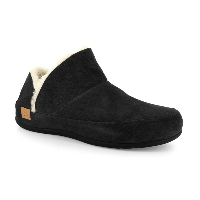 The Strive Womens Geneva Black by STRIVE is a black suede winter slipper with a low heel, closed toe, soft white lining, biomechanical footbed, and a small brown heel tag for simple, cozy comfort.