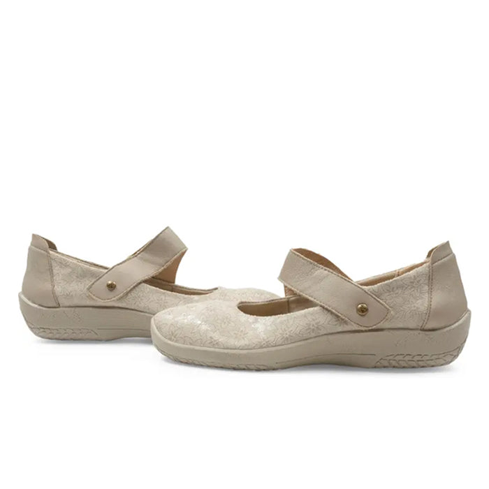 The ARCOPEDICO Womens Cosmo Taupe shoes are Mary Jane-style with a textured floral pattern, rounded toe, and adjustable button strap. They feature a low, cushioned sole for comfort.