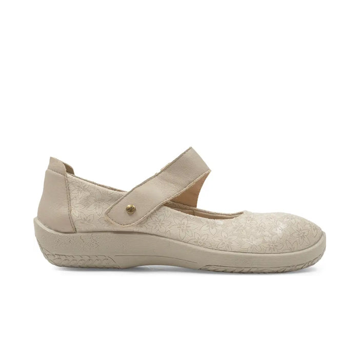The ARCOPEDICO Womens Cosmo Taupe features a textured floral design, adjustable Velcro strap, and flat rubber sole for casual style and everyday comfort.