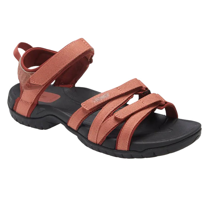 A single Teva Womens Tirra Aragon sandal in red with a black textured sole, adjustable ankle strap, open toe, and arch support is shown against a white background.
