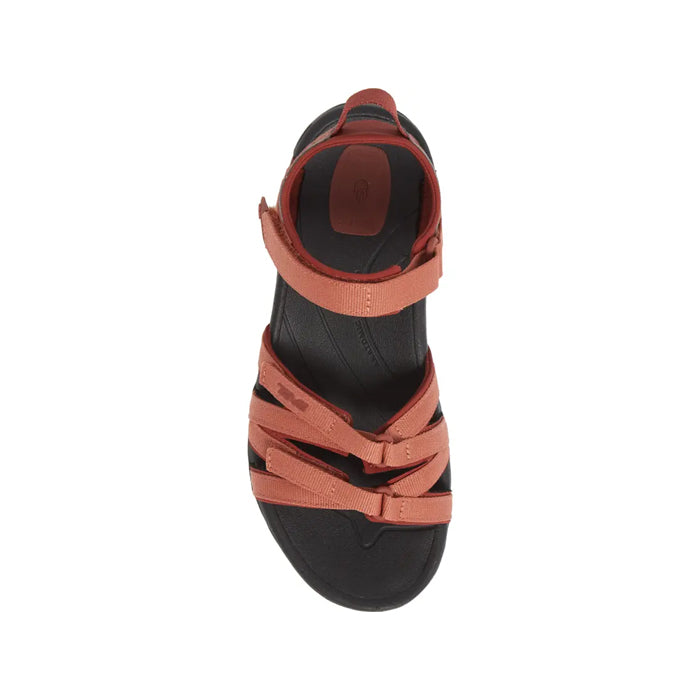 A top view of the Teva Womens Tirra Aragon sandal by Teva, shown on a white background, featuring a black sole with reddish-brown straps, three adjustable straps across the foot, one around the ankle, and built-in arch support.