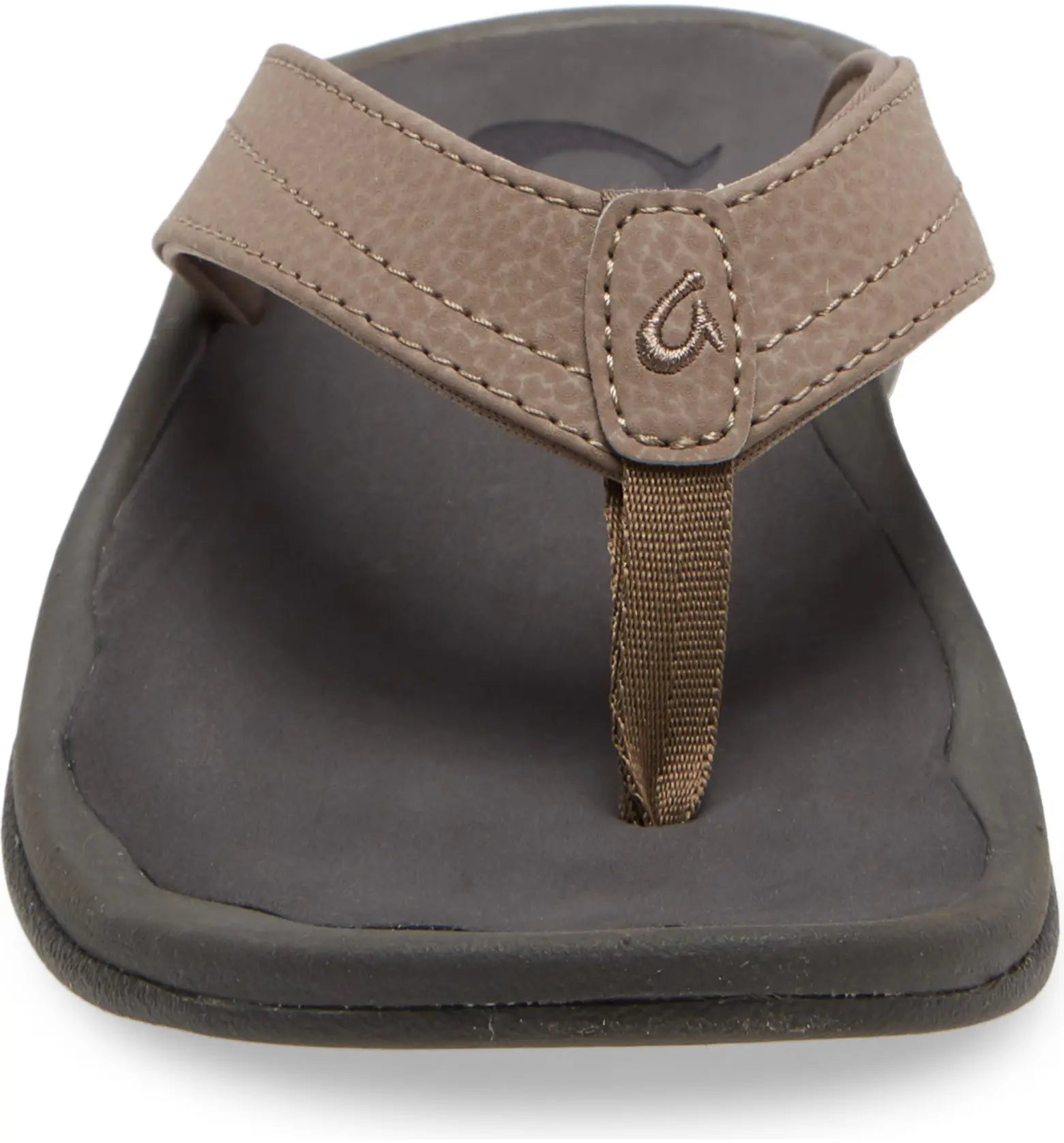 Front view of the OLUKAI Womens Ohana Taupe sandal, featuring a Wide textured strap with visible stitching, a center loop, and a black curved sole with an anatomical footbed for enhanced comfort.