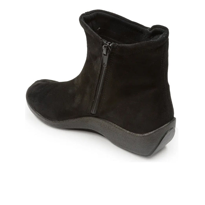 The Arcopedico Women’s L19 Stretch Bootie in black by ARCOPEDICO features a side zipper and orthopedic outsole for foot pain relief, shown from a back side angle on a white background.