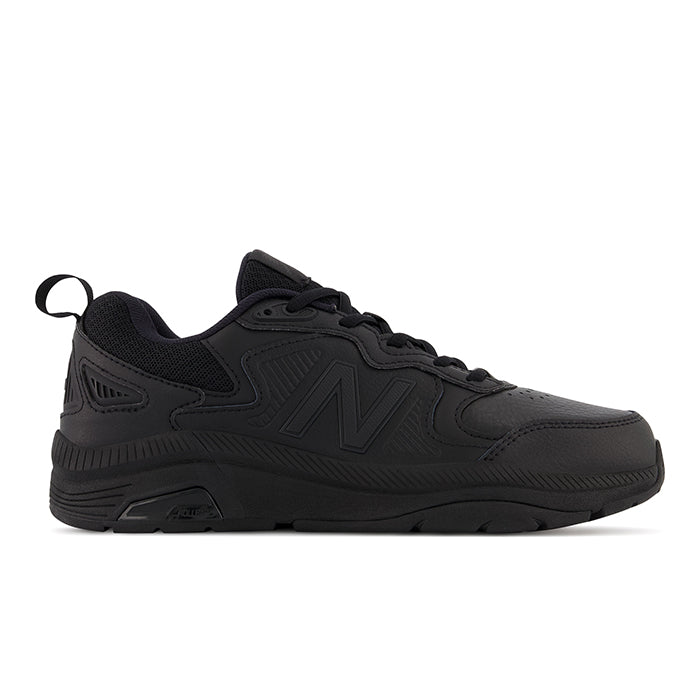 The New Balance Womens WX857 V3 Wide Black sneakers feature a low-top, lace-up design with a textured sole, subtle N logo, and ROLLBAR technology for added support.