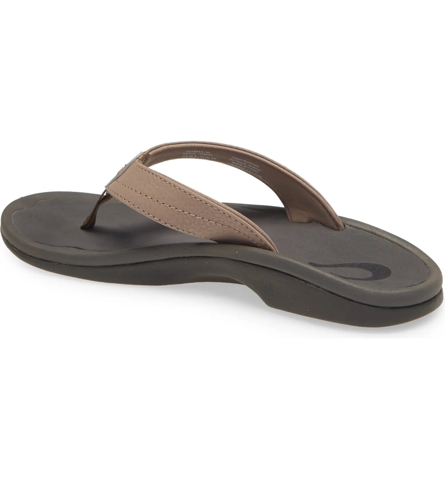 A single OLUKAI Womens Ohana Taupe sandal with a thick, cushioned sole and Wide taupe straps, featuring an anatomical footbed, is shown from a rear side angle on a plain white background.