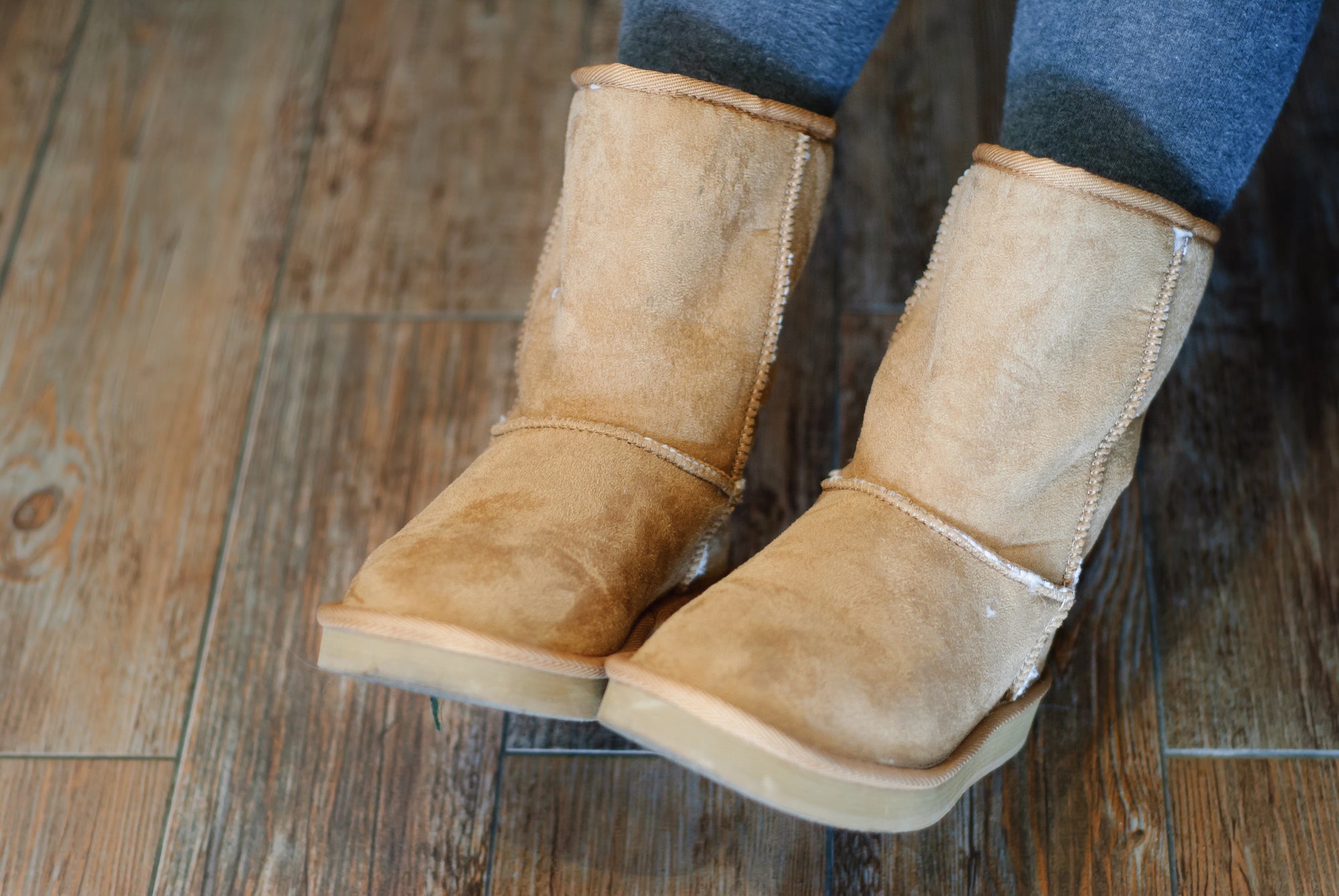 Woman wearing suede boots