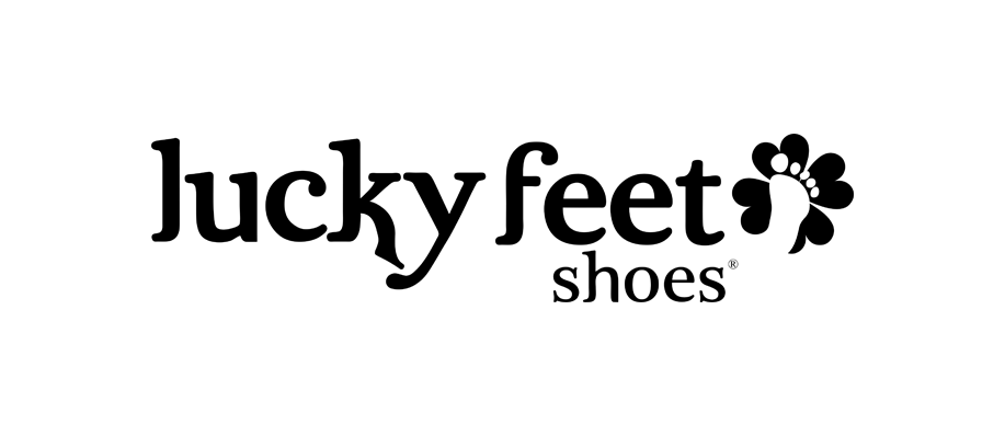 Logo for Lucky Feet Shoes with the words lucky feet shoes in black text. The word feet includes a footprint graphic as part of the letter t.