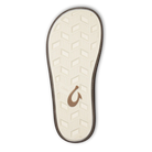The image shows the sole of the OLUKAI Mens Ulele Brown sandal featuring a white, textured herringbone tread, a brown curved logo at the center, and a black outline.