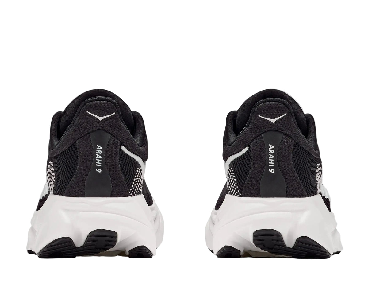 HOKA Men's Arahi 9 Black/White running shoe, padded heel counter and white midsole, rear heel view.