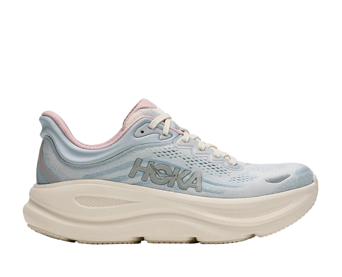 HOKA Women's Bondi 9 GLM Alabaster/Mineral Blue running shoe, light blue knit upper, off-white sole, angled view.