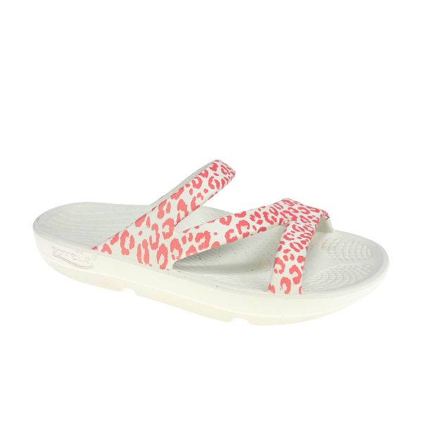 The Sovella Womens PF Slide Pink/Leopard by SOVELLA features two pink and white leopard print straps and a textured footbed for arch support, offering comfortable recovery with stylish flair.