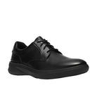 Outsole of the CLARKS Men's Code Hybrid Plain Wide Black Smooth shoe, rubber tread with arch support.