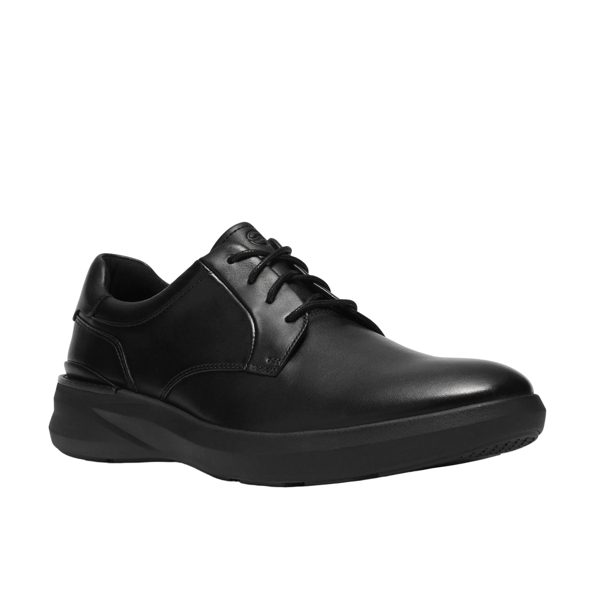 Outsole of the CLARKS Men's Code Hybrid Plain Wide Black Smooth shoe, rubber tread with arch support.