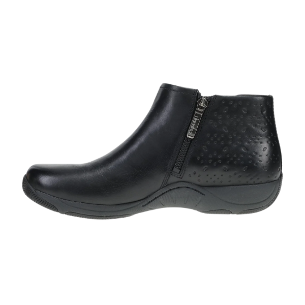 Dansko Women's Sherry Black bootie with side zipper, textured heel, and low slip-resistant sole, side view.