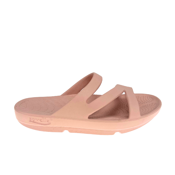 The SOVELLA Womens PF Slide Pink is a light pink slip-on sandal with three curved straps, a textured sole, and a contoured footbed with arch support for comfort and support. Lightweight design by SOVELLA.