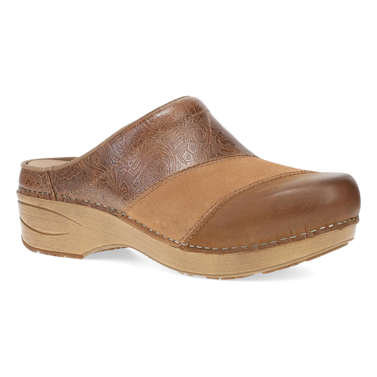 DANSKO Women's Zinnia Clog Tan Multi open-back mule, tooled tan leather upper, angled side view.