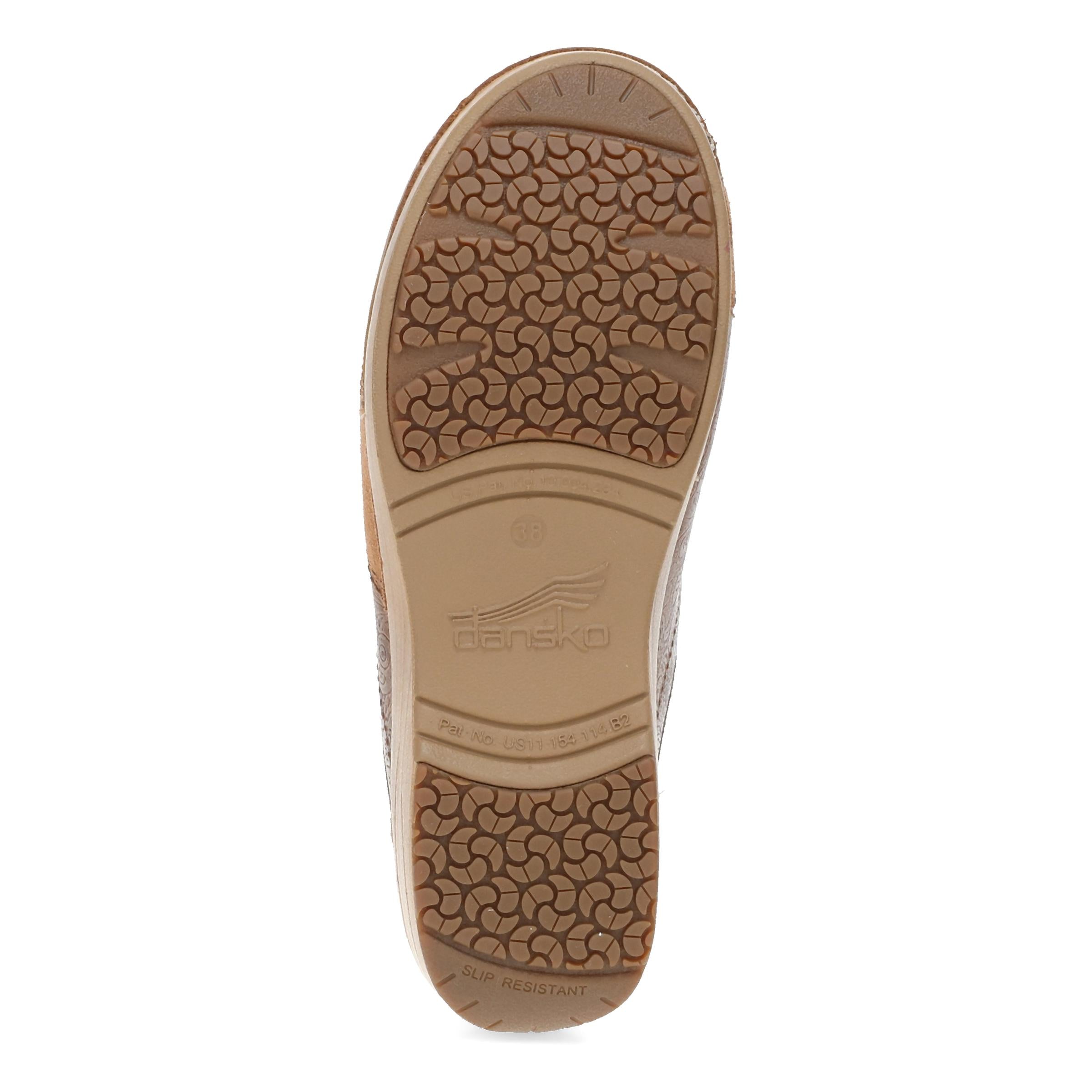 Outsole of the DANSKO Women's Zinnia Clog Tan Multi, patented slip-resistant rubber tread.
