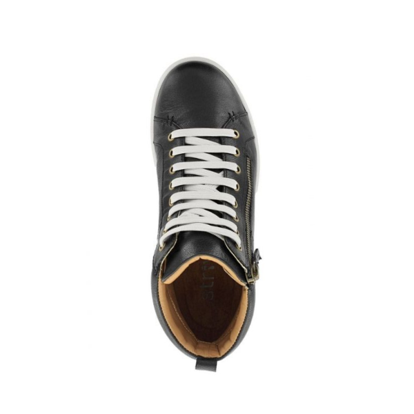 Top view of STRIVE Strive Women's Kensington Black sneaker with white laces, tan lining, and side zipper on white.