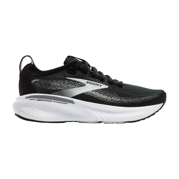 The BROOKS Women's Adrenaline GTS 25 Wide Black/White features a knit upper, white midsole, and black outsole. Shown from the side on a white background, it's ideal for runners with plantar fasciitis.
