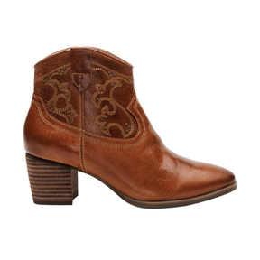 The Aetrex Women's Reagan Heel Boot Cognac by AETREX WORLDWide INC is a brown leather ankle boot with arch support, low stacked heel, pointed toe, and decorative side stitching, shown in profile on a white background.