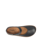 Top view of the Taos Women's Ultimate Leather Mary Jane Black shoe, featuring a black leather upper, instep strap, brown cushioned insole with arch support, and TAOS branding—ideal for women seeking comfortable footwear.
