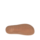 The image shows the bottom view of the TAOS Taos Women's Ultimate Leather Mary Jane Black shoe sole with a textured, swirled pattern and arch support, displayed on a plain white background.