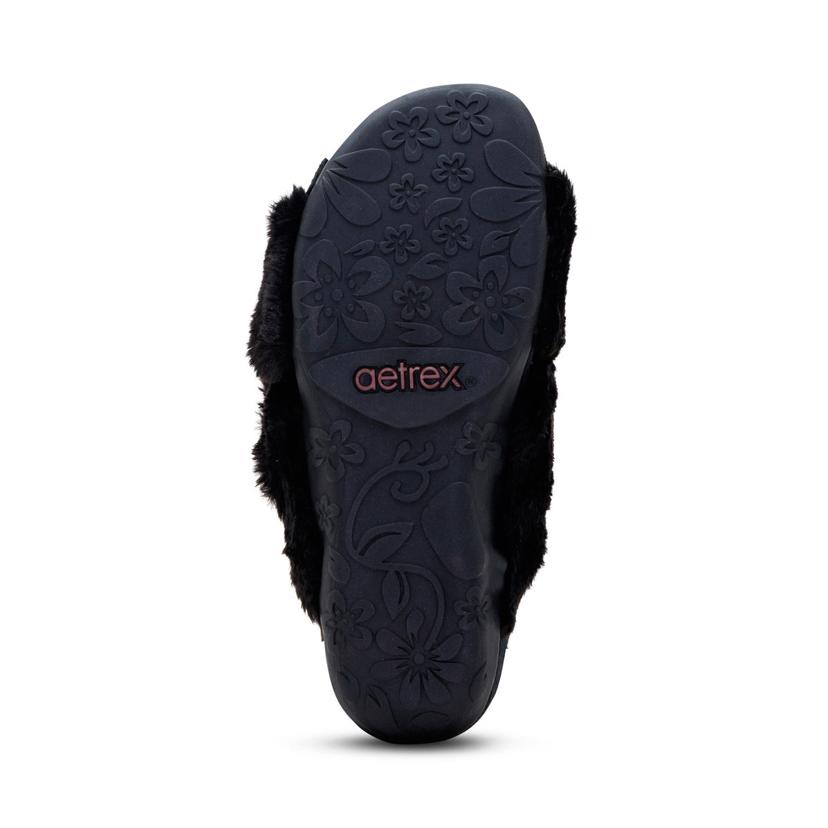 Outsole view of the AETREX Women's Macy Black slipper, durable rubber tread for indoor and outdoor grip.