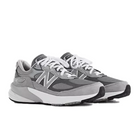 The NEW BALANCE Mens 990 v6 Wide Grey sneakers feature gray suede and mesh panels, white laces and midsoles, ENCAP midsole cushioning, and black outsoles, shown on a white background.