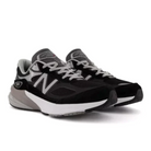 A pair of New Balance Mens 990 V6 Black running shoes with the iconic N logo and white laces, side by side on a white background—combining style and comfort from NEW BALANCE.