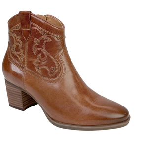 Brown cowboy boot with intricate stitching on a white background