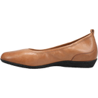 The TAOS Taos Womens Chit Chat Caramel is a tan leather flat with a rounded toe, black textured sole, small heel pull tab, and arch support for comfort—shown in side view. Ideal for everyday wear.