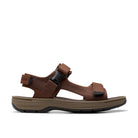 Side view of the Clarks Mens Saltway Edge Wide Brown sandal by CLARKS, featuring adjustable straps, black buckle, cushioned tan and black EVA sole, and visible stitching details against a white background.