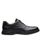 The CLARKS Mens Un Briley Pace Wide Black is a black leather lace-up casual shoe with stitching details, padded collar, thick contoured sole, and lightweight EVA midsole, shown in side profile on a white background.
