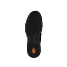 The image displays the black rubber sole of the CLARKS Un Briley Pace Wide mens comfort shoe, which has textured tread patterns for grip and a small brown oval near the heel. The shoe is shown against a white background.
