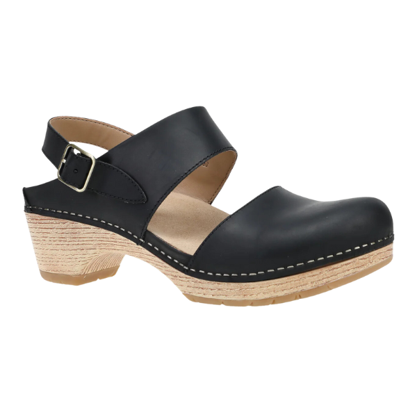 The Dansko Womens Lucia Black by DANSKO is a closed-toe leather clog sandal with a front strap, adjustable ankle buckle, light wooden heel, and visible stitching—ideal for comfortable wear and foot pain relief.