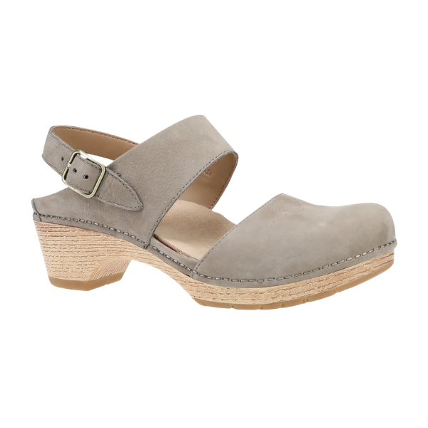 The Dansko Womens Lucia Taupe by DANSKO is a closed-toe clog in taupe suede, featuring a wooden low heel, adjustable ankle strap, visible stitching, and comfort designed for foot pain.
